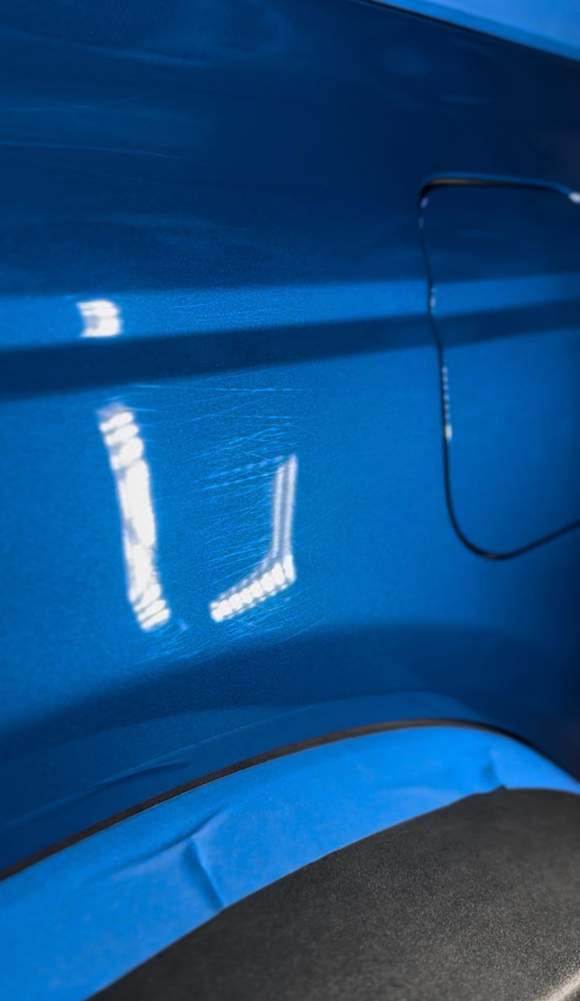 Blue vehicle paint after paint correction by Beastman Auto Detail